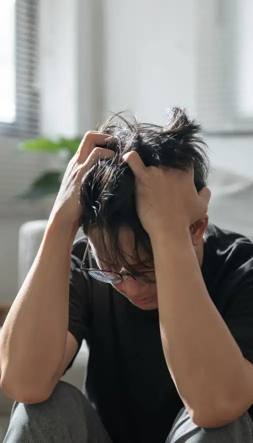 Image of upset man because of erectile dysfunction symptoms York